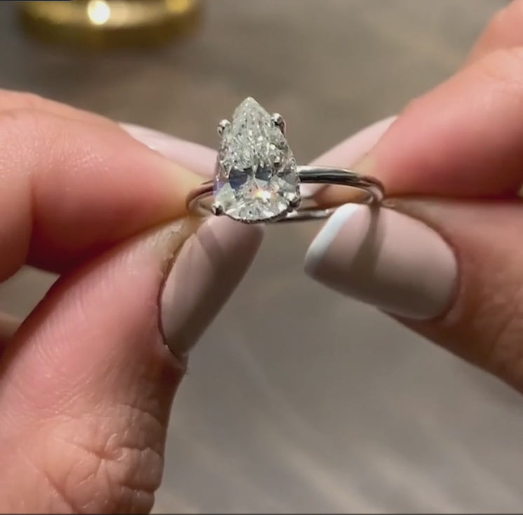 Pear Cut Solitaire Engagement Ring – 18K Gold & Platinum