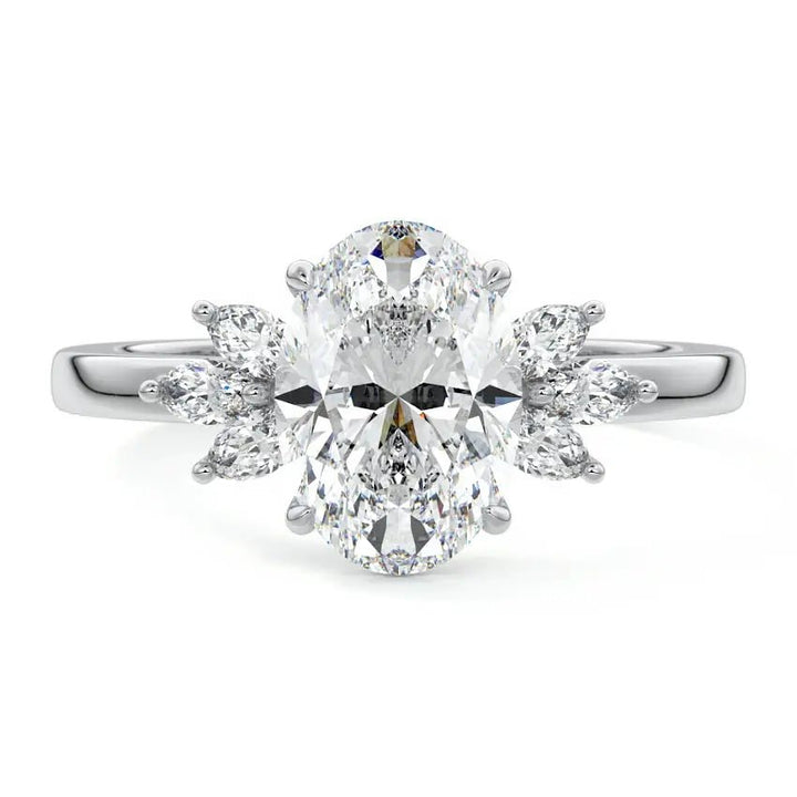 1.5 carat oval natural diamond engagement ring with marquise side stones in platinum