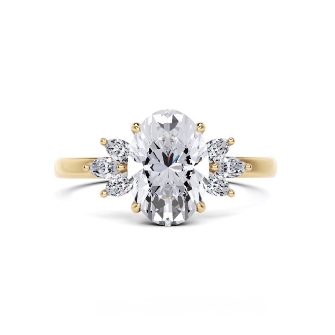 1.5 carat oval natural diamond engagement ring with marquise side stones in yellow gold