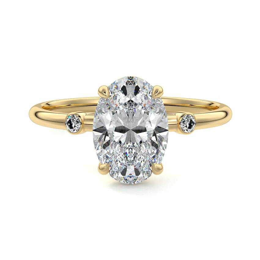 1.5 carat oval trilogy lab grown diamond engagement ring in 18K yellow gold