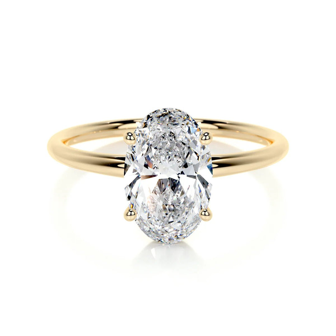 1 carat oval lab grown diamond solitaire engagement ring in yellow solid gold