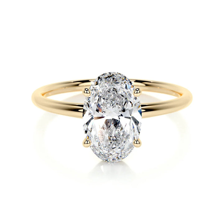 1 carat oval lab grown diamond solitaire engagement ring in yellow solid gold